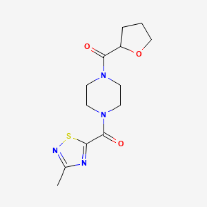 molecular formula C13H18N4O3S B2824108 (3-Methyl-1,2,4-thiadiazol-5-yl)(4-(tetrahydrofuran-2-carbonyl)piperazin-1-yl)methanone CAS No. 1448028-42-9