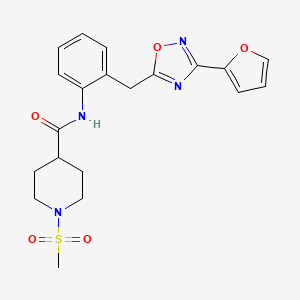 B2824340 N-(2-((3-(furan-2-yl)-1,2,4-oxadiazol-5-yl)methyl)phenyl)-1-(methylsulfonyl)piperidine-4-carboxamide CAS No. 1797068-11-1