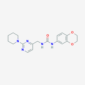 molecular formula C19H23N5O3 B2824854 1-(2,3-二氢苯并[b][1,4]二噁杂环-6-基)-3-((2-(哌啶-1-基)嘧啶-4-基甲基)脲 CAS No. 1797081-81-2
