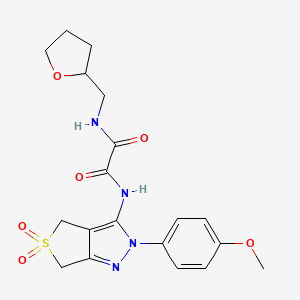 molecular formula C19H22N4O6S B2825114 N-[2-(4-methoxyphenyl)-5,5-dioxo-2H,4H,6H-5lambda6-thieno[3,4-c]pyrazol-3-yl]-N'-[(oxolan-2-yl)methyl]ethanediamide CAS No. 899733-37-0