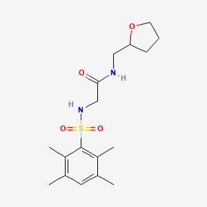 molecular formula C17H26N2O4S B2827588 N-[(oxolan-2-yl)methyl]-2-(2,3,5,6-tetramethylbenzenesulfonamido)acetamide CAS No. 690246-10-7