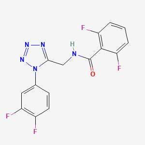 molecular formula C15H9F4N5O B2830364 N-((1-(3,4-difluorophenyl)-1H-tetrazol-5-yl)methyl)-2,6-difluorobenzamide CAS No. 921103-38-0