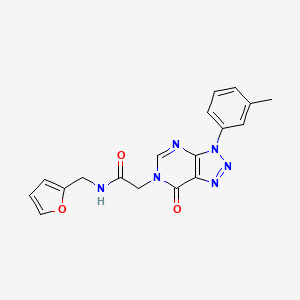 molecular formula C18H16N6O3 B2830617 N-[(furan-2-yl)methyl]-2-[3-(3-methylphenyl)-7-oxo-3H,6H,7H-[1,2,3]triazolo[4,5-d]pyrimidin-6-yl]acetamide CAS No. 888419-64-5