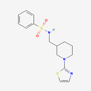 molecular formula C15H19N3O2S2 B2831895 N-{[1-(1,3-thiazol-2-yl)piperidin-3-yl]methyl}benzenesulfonamide CAS No. 1706285-87-1