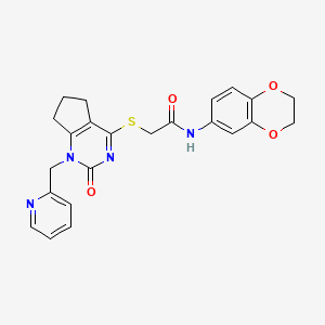 molecular formula C23H22N4O4S B2833259 N-(2,3-dihydrobenzo[b][1,4]dioxin-6-yl)-2-((2-oxo-1-(pyridin-2-ylmethyl)-2,5,6,7-tetrahydro-1H-cyclopenta[d]pyrimidin-4-yl)thio)acetamide CAS No. 899955-07-8