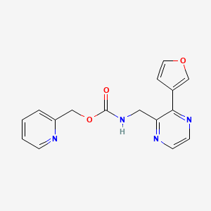 molecular formula C16H14N4O3 B2833335 (pyridin-2-yl)methyl N-{[3-(furan-3-yl)pyrazin-2-yl]methyl}carbamate CAS No. 2034312-45-1