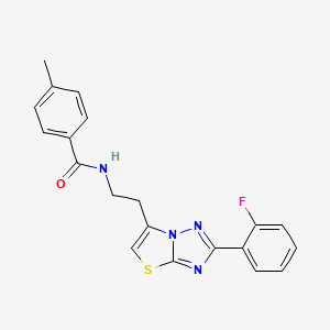molecular formula C20H17FN4OS B2834576 N-{2-[2-(2-fluorophenyl)-[1,2,4]triazolo[3,2-b][1,3]thiazol-6-yl]ethyl}-4-methylbenzamide CAS No. 895790-26-8