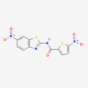 molecular formula C12H6N4O5S2 B2834739 5-nitro-N-(6-nitro-1,3-benzothiazol-2-yl)thiophene-2-carboxamide CAS No. 328038-47-7