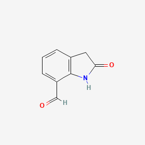 molecular formula C9H7NO2 B2835312 2-Oxo-2,3-dihydro-1H-indole-7-carbaldehyde CAS No. 933753-63-0