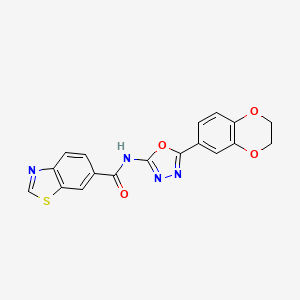 molecular formula C18H12N4O4S B2836461 N-[5-(2,3-dihydro-1,4-benzodioxin-6-yl)-1,3,4-oxadiazol-2-yl]-1,3-benzothiazole-6-carboxamide CAS No. 862808-59-1