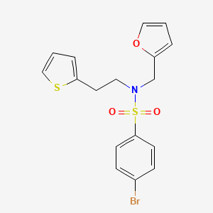 4-bromo-N-(furan-2-ylmethyl)-N-(2-(thiophen-2-yl)ethyl)benzenesulfonamide