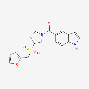 molecular formula C18H18N2O4S B2842669 (3-((furan-2-ylmethyl)sulfonyl)pyrrolidin-1-yl)(1H-indol-5-yl)methanone CAS No. 1787917-38-7