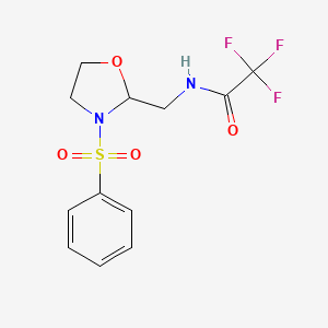 molecular formula C12H13F3N2O4S B2842911 2,2,2-trifluoro-N-((3-(phenylsulfonyl)oxazolidin-2-yl)methyl)acetamide CAS No. 1170095-56-3