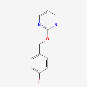 2-[(4-Fluorophenyl)methoxy]pyrimidine
