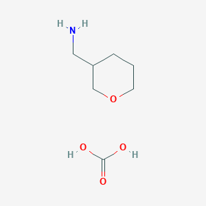 (Tetrahydro-2H-pyran-3-yl)methanamine carbonate(2:1)