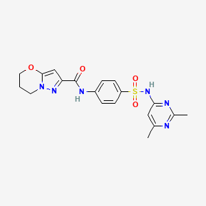 molecular formula C19H20N6O4S B2851438 N-(4-(N-(2,6-dimethylpyrimidin-4-yl)sulfamoyl)phenyl)-6,7-dihydro-5H-pyrazolo[5,1-b][1,3]oxazine-2-carboxamide CAS No. 1428374-00-8