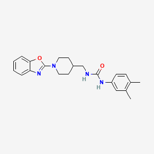 B2852181 1-((1-(Benzo[d]oxazol-2-yl)piperidin-4-yl)methyl)-3-(3,4-dimethylphenyl)urea CAS No. 1797257-97-6