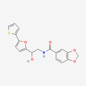 molecular formula C18H15NO5S B2852679 N-{2-hydroxy-2-[5-(thiophen-2-yl)furan-2-yl]ethyl}-2H-1,3-benzodioxole-5-carboxamide CAS No. 2319717-39-8