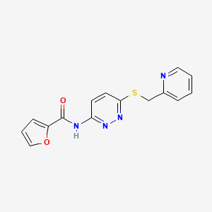 molecular formula C15H12N4O2S B2854269 N-(6-((pyridin-2-ylmethyl)thio)pyridazin-3-yl)furan-2-carboxamide CAS No. 1021026-46-9