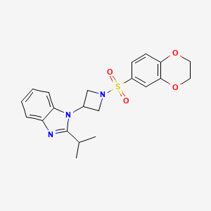 molecular formula C21H23N3O4S B2855074 1-[1-(2,3-dihydro-1,4-benzodioxine-6-sulfonyl)azetidin-3-yl]-2-(propan-2-yl)-1H-1,3-benzodiazole CAS No. 2415632-00-5