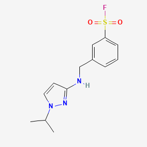 molecular formula C13H16FN3O2S B2855190 3-[[(1-Propan-2-ylpyrazol-3-yl)amino]methyl]benzenesulfonyl fluoride CAS No. 2418719-31-8
