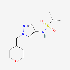 molecular formula C12H21N3O3S B2855843 N-{1-[(oxan-4-yl)methyl]-1H-pyrazol-4-yl}propane-2-sulfonamide CAS No. 1706270-68-9