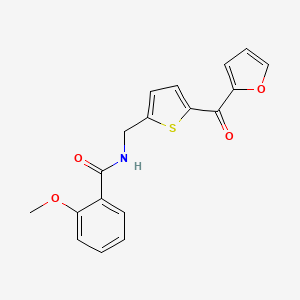molecular formula C18H15NO4S B2857231 N-((5-(furan-2-carbonyl)thiophen-2-yl)methyl)-2-methoxybenzamide CAS No. 1797613-18-3
