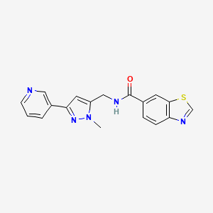 molecular formula C18H15N5OS B2858689 N-((1-methyl-3-(pyridin-3-yl)-1H-pyrazol-5-yl)methyl)benzo[d]thiazole-6-carboxamide CAS No. 2034278-38-9