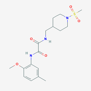 molecular formula C17H25N3O5S B2858853 N-[(1-methanesulfonylpiperidin-4-yl)methyl]-N'-(2-methoxy-5-methylphenyl)ethanediamide CAS No. 1235621-43-8