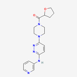 (4-(6-(Pyridin-3-ylamino)pyridazin-3-yl)piperazin-1-yl)(tetrahydrofuran-2-yl)methanone