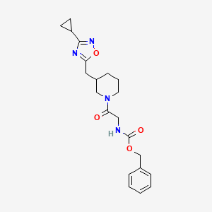 molecular formula C21H26N4O4 B2859314 Benzyl (2-(3-((3-cyclopropyl-1,2,4-oxadiazol-5-yl)methyl)piperidin-1-yl)-2-oxoethyl)carbamate CAS No. 1706316-80-4