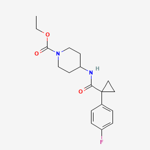 molecular formula C18H23FN2O3 B2860570 ethyl 4-[1-(4-fluorophenyl)cyclopropaneamido]piperidine-1-carboxylate CAS No. 1207041-26-6