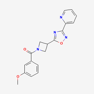 molecular formula C18H16N4O3 B2861750 (3-Methoxyphenyl)(3-(3-(pyridin-2-yl)-1,2,4-oxadiazol-5-yl)azetidin-1-yl)methanone CAS No. 1251564-92-7