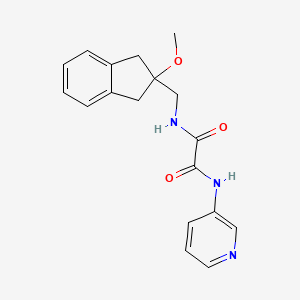 molecular formula C18H19N3O3 B2864484 N-[(2-methoxy-2,3-dihydro-1H-inden-2-yl)methyl]-N'-(pyridin-3-yl)ethanediamide CAS No. 2034261-90-8