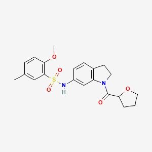 2-methoxy-5-methyl-N-(1-(tetrahydrofuran-2-carbonyl)indolin-6-yl)benzenesulfonamide