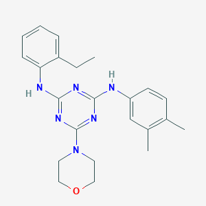 molecular formula C23H28N6O B2865432 N2-(3,4-dimethylphenyl)-N4-(2-ethylphenyl)-6-(morpholin-4-yl)-1,3,5-triazine-2,4-diamine CAS No. 946208-84-0