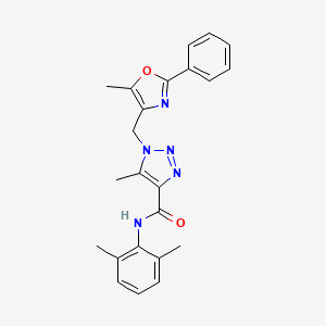 molecular formula C23H23N5O2 B2867211 N-(2,6-dimethylphenyl)-5-methyl-1-[(5-methyl-2-phenyl-1,3-oxazol-4-yl)methyl]-1H-1,2,3-triazole-4-carboxamide CAS No. 946254-69-9
