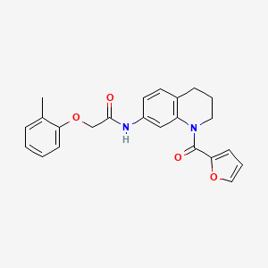 molecular formula C23H22N2O4 B2869068 N-[1-(furan-2-carbonyl)-1,2,3,4-tetrahydroquinolin-7-yl]-2-(2-methylphenoxy)acetamide CAS No. 946244-20-8