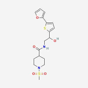 molecular formula C17H22N2O5S2 B2871855 N-{2-[5-(furan-2-yl)thiophen-2-yl]-2-hydroxyethyl}-1-methanesulfonylpiperidine-4-carboxamide CAS No. 2309345-13-7