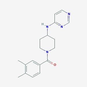 molecular formula C18H22N4O B2871879 N-[1-(3,4-dimethylbenzoyl)piperidin-4-yl]pyrimidin-4-amine CAS No. 2415572-85-7