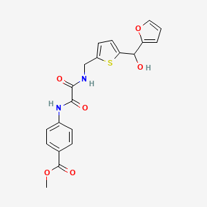 molecular formula C20H18N2O6S B2871882 methyl 4-{[({5-[(furan-2-yl)(hydroxy)methyl]thiophen-2-yl}methyl)carbamoyl]formamido}benzoate CAS No. 1795442-28-2