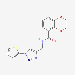molecular formula C16H14N4O3S B2872937 N-((1-(thiophen-2-yl)-1H-1,2,3-triazol-4-yl)methyl)-2,3-dihydrobenzo[b][1,4]dioxine-5-carboxamide CAS No. 2034228-66-3