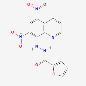 molecular formula C14H9N5O6 B2875067 N'-(5,7-dinitroquinolin-8-yl)furan-2-carbohydrazide CAS No. 443314-94-1
