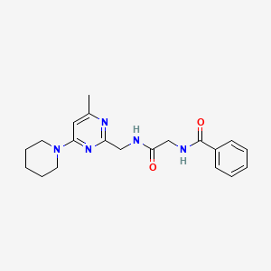 N-(2-(((4-methyl-6-(piperidin-1-yl)pyrimidin-2-yl)methyl)amino)-2-oxoethyl)benzamide