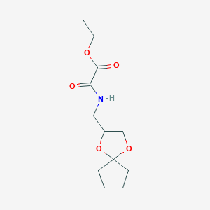 molecular formula C12H19NO5 B2875972 Ethyl 2-((1,4-dioxaspiro[4.4]nonan-2-ylmethyl)amino)-2-oxoacetate CAS No. 1206988-06-8