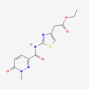 molecular formula C13H14N4O4S B2876493 Ethyl 2-(2-(1-methyl-6-oxo-1,6-dihydropyridazine-3-carboxamido)thiazol-4-yl)acetate CAS No. 938532-75-3