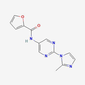 molecular formula C13H11N5O2 B2876673 N-(2-(2-methyl-1H-imidazol-1-yl)pyrimidin-5-yl)furan-2-carboxamide CAS No. 1421493-80-2