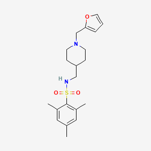 molecular formula C20H28N2O3S B2876784 N-((1-(furan-2-ylmethyl)piperidin-4-yl)methyl)-2,4,6-trimethylbenzenesulfonamide CAS No. 953230-54-1