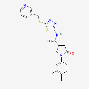 B2876921 1-(3,4-dimethylphenyl)-5-oxo-N-(5-((pyridin-3-ylmethyl)thio)-1,3,4-thiadiazol-2-yl)pyrrolidine-3-carboxamide CAS No. 872595-53-4