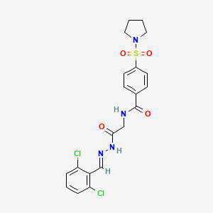 (E)-N-(2-(2-(2,6-dichlorobenzylidene)hydrazinyl)-2-oxoethyl)-4-(pyrrolidin-1-ylsulfonyl)benzamide